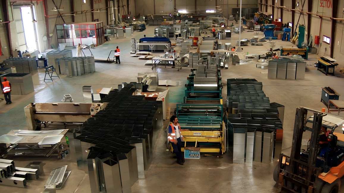 HVAC fabrication shop with multiple workstations